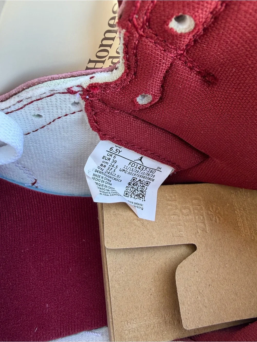 Jordan Women’s High-Top Sneaker in White and Burgundy